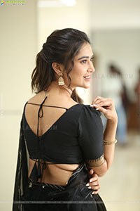 Dhashvika Gorgeous stills in Black Half Saree