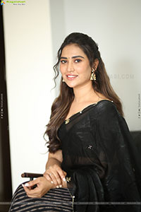 Dhashvika Gorgeous stills in Black Half Saree