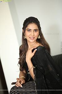 Dhashvika Gorgeous stills in Black Half Saree