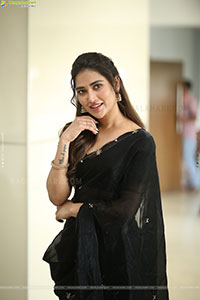 Dhashvika Gorgeous stills in Black Half Saree