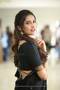 Dhashvika Gorgeous stills in Black Half Saree