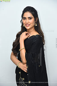Dhashvika Gorgeous stills in Black Half Saree