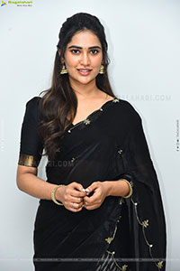 Dhashvika Gorgeous stills in Black Half Saree