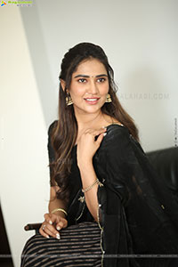 Dhashvika Gorgeous stills in Black Half Saree