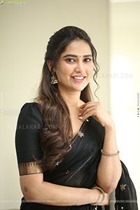 Dhashvika Gorgeous stills in Black Half Saree