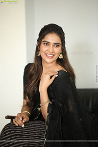 Dhashvika Gorgeous stills in Black Half Saree