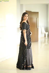Dhashvika Gorgeous stills in Black Half Saree