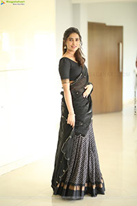 Dhashvika Gorgeous stills in Black Half Saree