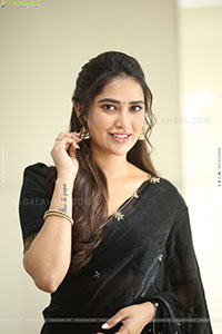 Dhashvika Gorgeous stills in Black Half Saree
