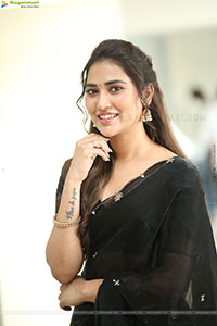 Dhashvika Gorgeous stills in Black Half Saree
