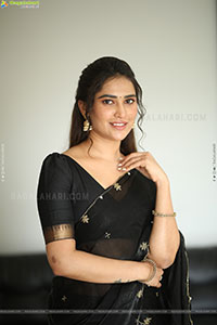 Dhashvika Gorgeous stills in Black Half Saree