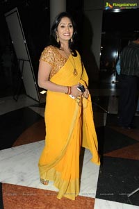 Anchor Jhansi in Yellow Saree